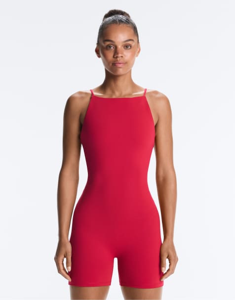 OYSHO – Evermove – Röd, kort jumpsuit med båtringning - view 1
