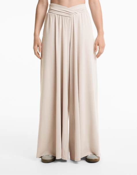 OYSHO Extra wide v-cut waist floaty trousers with modal in pale mink - view 1