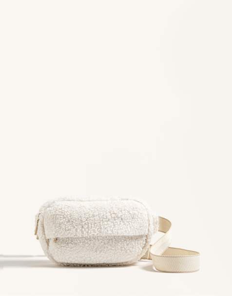 OYSHO Faux shearling belt bag in ecru - view 1