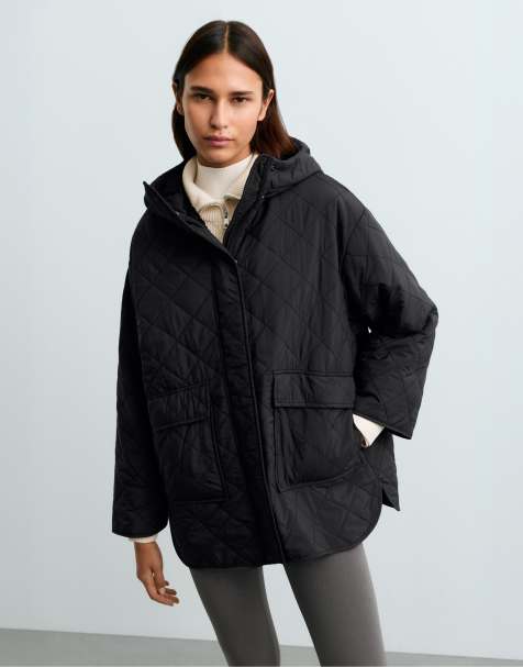 OYSHO Fellex® aerogel padded jacket with faux-fur-effect interior in black - view 1
