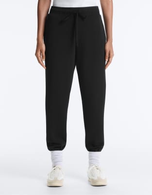 OYSHO - Figurbetonte Hose aus Modalmix in Schwarz mit gerippten Details