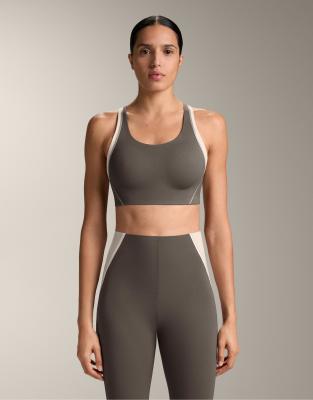 OYSHO Firm support compressive reflective sports bra in coal-Grey