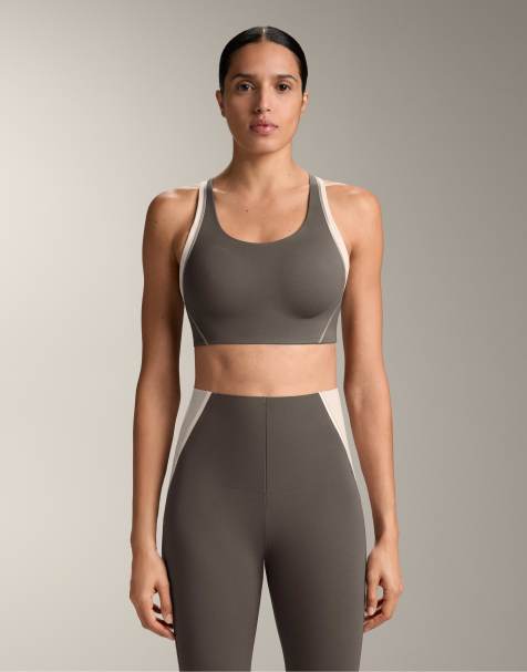 OYSHO Firm support compressive reflective sports bra in coal - view 1