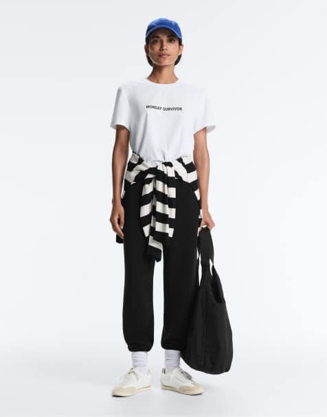 OYSHO Fitted trousers with rib details and modal in black