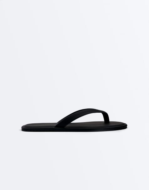 OYSHO – Flache Sandalen in Schwarz mit Steppnähten - view 1