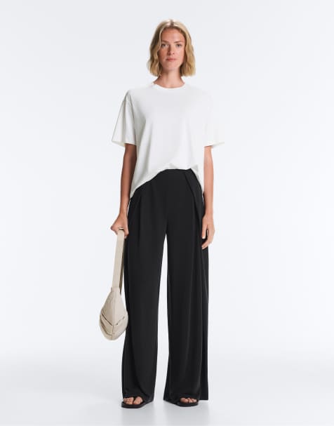 OYSHO – Gerade geschnittene Hose aus Modalmix in Schwarz mit seitlicher Bundfalte - view 1