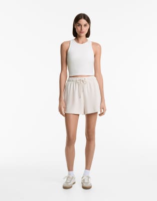 Oysho – Geripptes, langes Tanktop aus Modalmix in Weiß