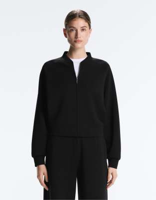 OYSHO - Gestreifte Bomberjacke in Schwarz mit weichem Modal