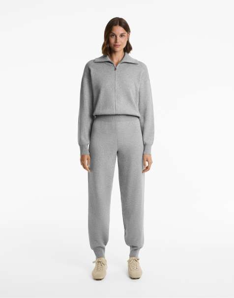 OYSHO Half-zip long knit jumpsuit in black - view 1