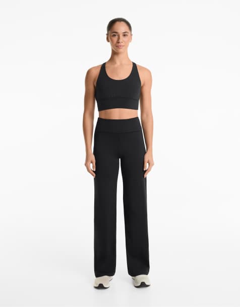 Oysho High-rise comfortlux straight-leg trousers in black - view 1