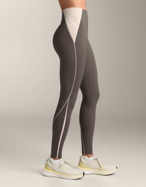 OYSHO High-rise compressive reflective core control ankle-length leggings in black - view 1