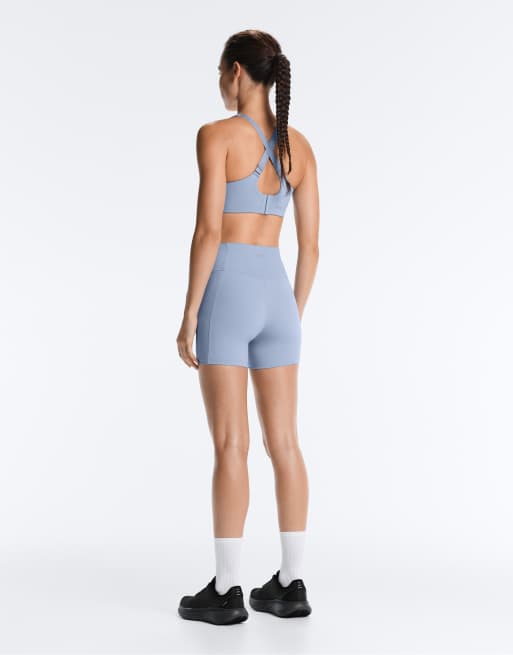 OYSHO - Hot pants a vita alta compressivi blu con tasche da 10 cm, 4 di 7