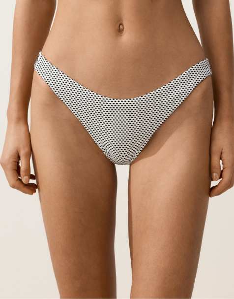 OYSHO - Hvide/sorte bikinitrusser med medium dækning og U-snit i jacquard med polkaprikker - view 1