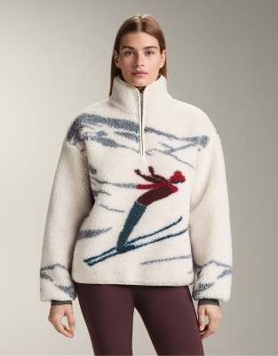 OYSHO - Jacke aus Lammfellimitat in Ecru mit kurzem Reißverschluss und Skifahrer-Motiv-Neutral