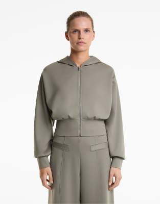 OYSHO - Jacke in Grün mit Neoprenoptik und Kapuze