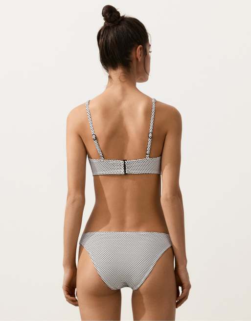 OYSHO Jacquard polka dot halter bikini top in white and black | ASOS