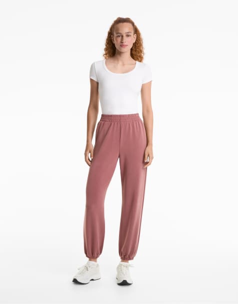 OYSHO Joggers with modal in dark rosette
