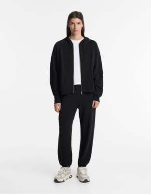 Oysho - Kastige Kapuzenjacke aus Modalmix in Schwarz