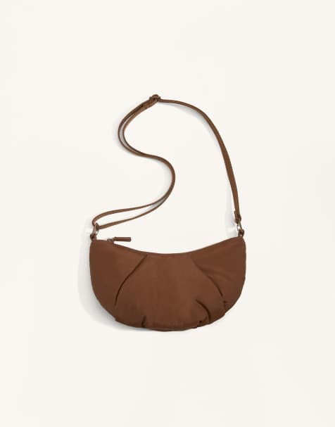 OYSHO – Kleine gesteppte Umhängetasche in Hellbraun - view 1