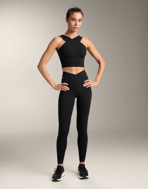 OYSHO – Knöchellange Kompressions-Leggings in Schwarz mit hohem Bund und Zierausschnitt an der Taille - view 1