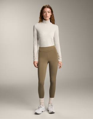 OYSHO - Knöchellange, warme Leggings in Military-Khaki mit Taschen und hohem Bund, 70 cm Schrittlänge-Grün
