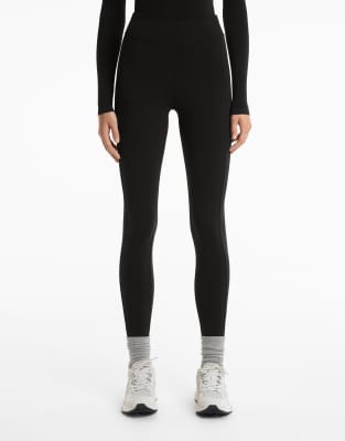 OYSHO - Knöchellange, warme Leggings in Schwarz mit Taschen und hohem Bund, 70 cm Schrittlänge
