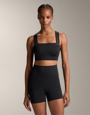 Oysho - Kompressions-Tanktop in Schwarz mit Cutwork-Design