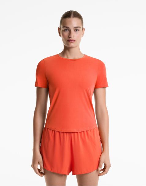 OYSHO – Kurzärmliges Funktions-T-Shirt in Orange - view 1