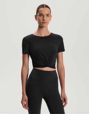Oysho - Kurzärmliges T-Shirt aus Modal-Mix in Schwarz mit Knotendesign