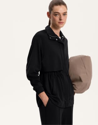 OYSHO - Lange Jacke in Schwarz mit weichem Modal und Taschen