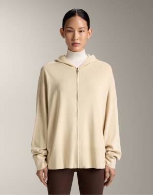 OYSHO - Lange Strickjacke in Beige mit Kapuze-Neutral