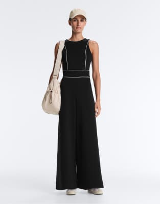 Oysho - Langer Pikee-Jumpsuit in Schwarz mit Baumwollanteil und Paspelierung