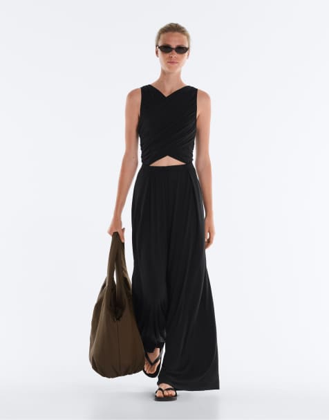 OYSHO – Langer Wickel-Jumpsuit aus Modalmix in Schwarz - view 1