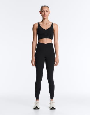 Oysho - Legging léger 65 cm longueur cheville coupe en V en tissu léger - Noir