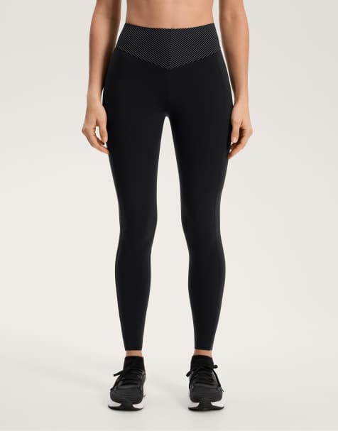 OYSHO - Legging taille haute et longueur cheville 65 cm style basique avec effet de compression et bande rayée - Noir - view 1