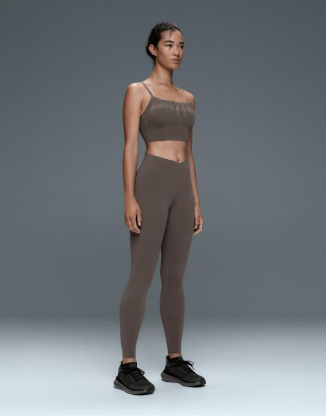 OYSHO leggings med V-udskæring og let touch, 65 cm ankellange, i brun-khaki - view 1