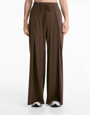 Oysho - Leichte Hose in Hellbraun mit Faltendetail und weitem Bein