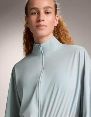 Oysho - Leichte Jacke in Steinblau mit kühlendem Effekt
