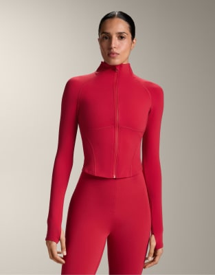 OYSHO - Leichte, warme Jacke in Rot mit Ziernaht