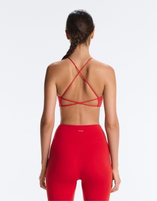 OYSHO Light-support comfortlux cross-back sports bra in red