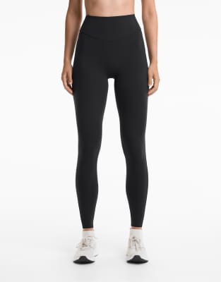 OYSHO - Light Touch - Knöchellange Leggings in Schwarz mit Taschen, 20 cm Innenbeinlänge