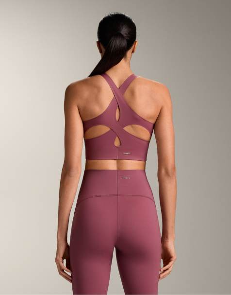 OYSHO Light touch medium-support sports bra in bright pink - view 1