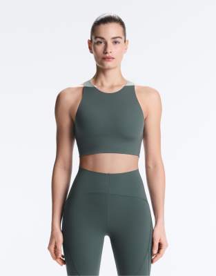 OYSHO Light touch medium-support sports bra in green