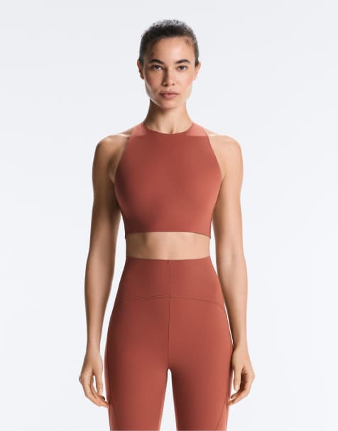OYSHO Light touch medium-support sports bra in tile red