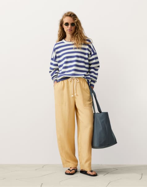OYSHO Lyocell blend and 24% linen straight trousers in yellow
