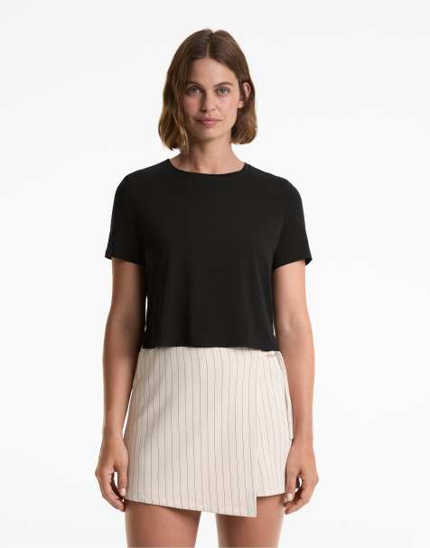 OYSHO Lyocell blend short-sleeved crop t-shirt in black - view 1