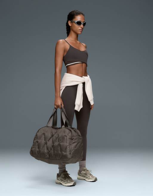 OYSHO Medium support comfortlux crossover rib sports bra in grey brown, 2 of 7