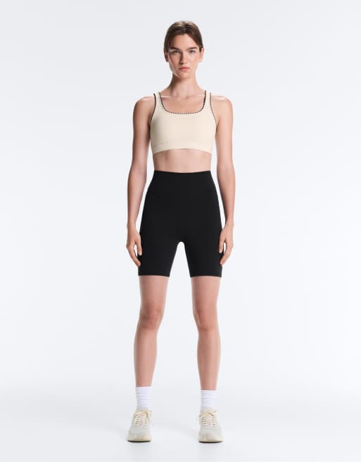 OYSHO Medium-support comfortlux sports bra with contrast seams in pale ecru, 7 of 7