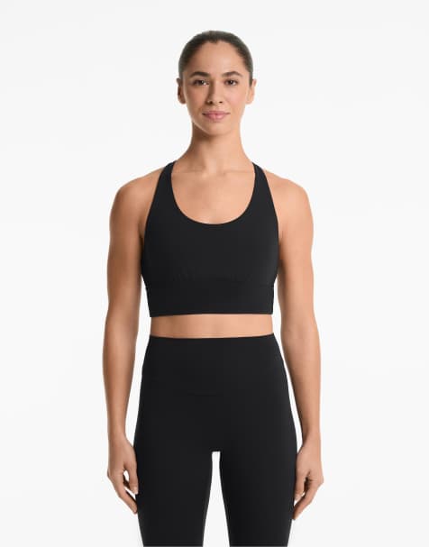 Oysho medium-support comfortlux sports bra with cups in black - view 1