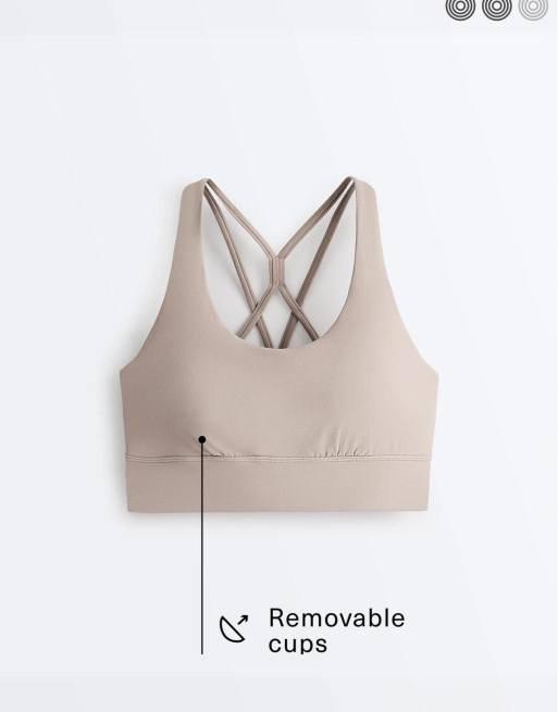 OYSHO Medium-support comfortlux sports bra with cups in pale taupe, 6 of 7